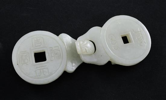 A Chinese celadon jade two piece belt buckle, 19th century, 9.8cm